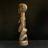 Statuetă africană din lemn, reprezentând o figură feminină de fertilit