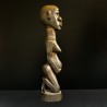Statuetă africană din lemn, reprezentând o figură feminină de fertilit